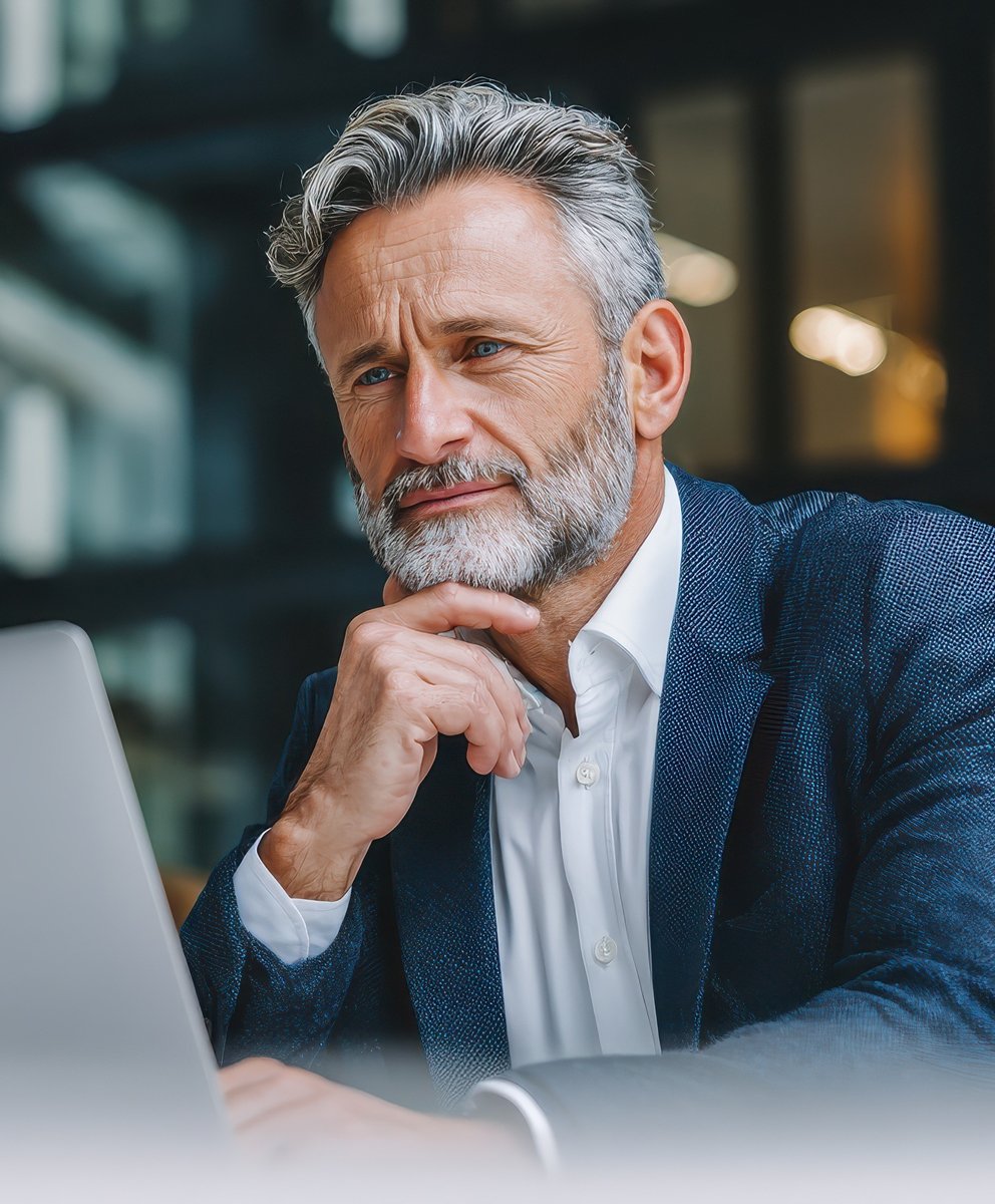 AdobeStock_1671313555-busy-executive-computer